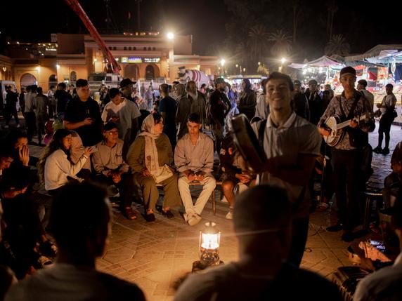 Young Moroccans in Djemaa El-Fna square in Marrakech, Morocco, on October 9, 2025.