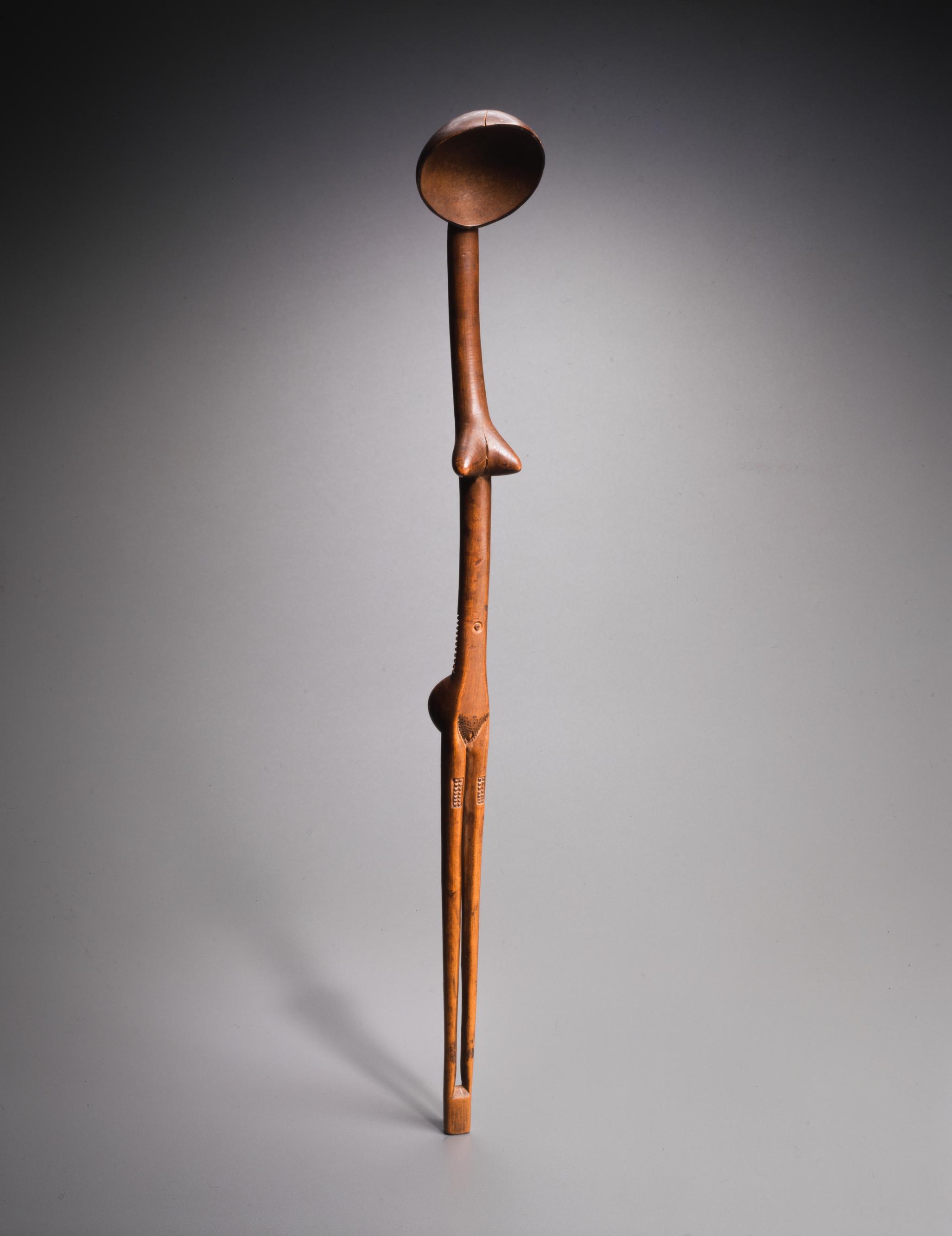 Antropomorfik ukhezo kaşığı, Zulu halkı, Güney Afrika, 19. yüzyıl, 20. yüzyıl başı (tahta, 54,5 cm x 7 cm x 7 cm).