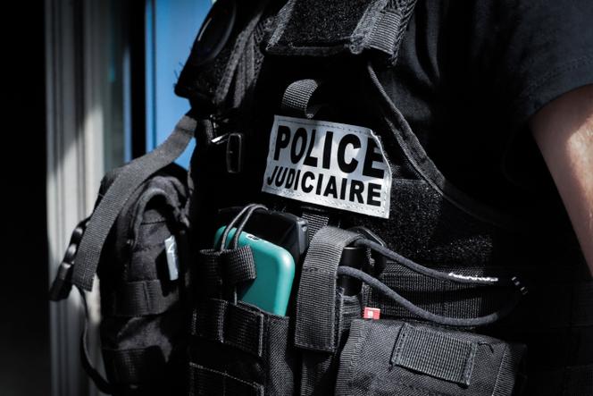 A French judiciary police officer enters to examine a damaged annexe of a town hall in Saint-Etienne-du-Rouvray near Rouen, northwestern France, on June 30, 2023. A third consecutive night of violence in France sparked by the killing of a teenager by a policeman during a traffic stop has left 249 police and gendarmes injured, the interior ministry announced on June 30. Nahel M., 17, was shot in the chest at point-blank range on the morning of June 27, 2023, in an incident that has reignited debate in France about police tactics long criticised by rights groups over the treatment of people in low-income suburbs, particularly ethnic minorities. (Photo by LOU BENOIST / AFP)