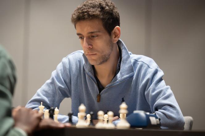 Daniel Naroditsky plays chess on the board, in this undated photo released by Charlotte Chess Center.