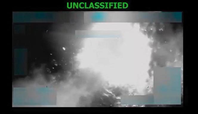 This screen grab from a video posted by US Defense Secretary Pete Hegseth on his X account on October 22, 2025, shows what Hegseth says is US military forces conducting a strike on a vessel in the Eastern Pacific Ocean on October 21, 2025.  