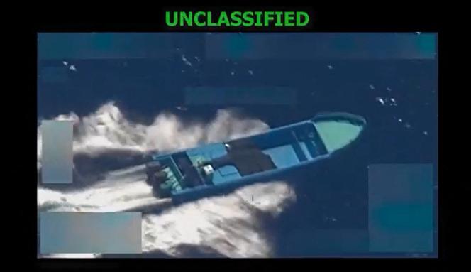This screen grab from a video posted by US Defense Secretary Pete Hegseth on his X account on October 22, 2025, shows what Hegseth says is US military forces conducting a strike on a vessel in the Eastern Pacific Ocean on October 21, 2025.  