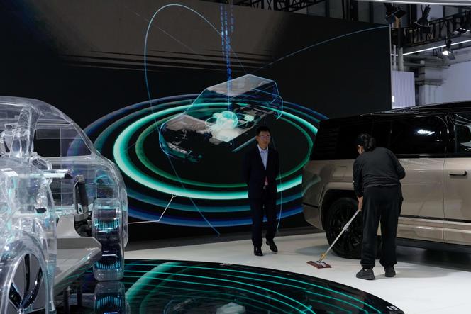 Un stand de technologie automobile à la convention sur les véhicules interconnectés à Pékin, en Chine, le 16 octobre 2025.
