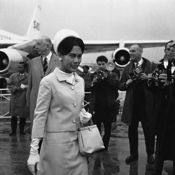Queen Sirikit of Thailand walks from the plane at London Airport, United Kingdom, on July 16, 1966.