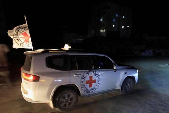 Red Cross transports the body of a deceased hostage, who had been held in Gaza since the deadly October 7, 2023, attack, after it was handed over by Hamas militants, in Gaza City, on October 27, 2025.