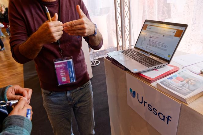 Stand de l’Urssaf Limousin, qui gère le statut d’artiste-auteur, lors du MaMA Music Festival et Convention, à Paris, le 15 octobre 2025.