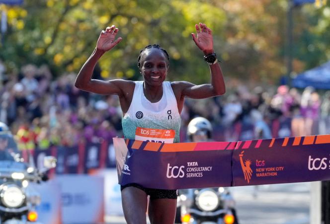 Kenya's Hellen Obiri crosses the line to win the women's New York CIty Marathon, November 2, 2025.