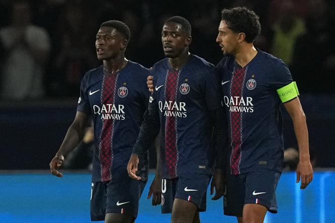 PSG's Nuno Mendes, from left, Ousmane Dembélé and Marquinhos during the Champions League opening phase soccer match between Paris Saint-Germain and Bayern Munich in Paris, France, on November 4, 2025.