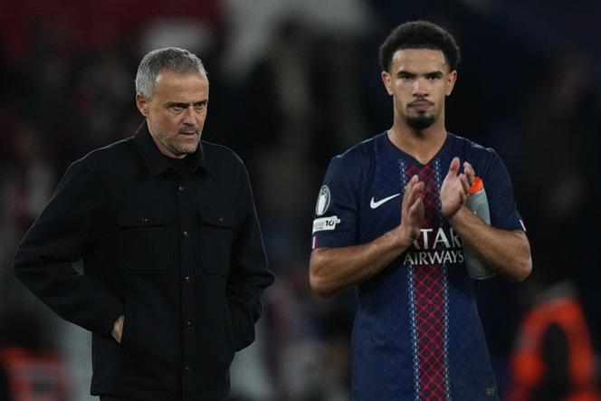 Paris Saint-Germain coach Luis Enrique and Warren Zaïre-Emery during a match in Paris, November 4, 2025.