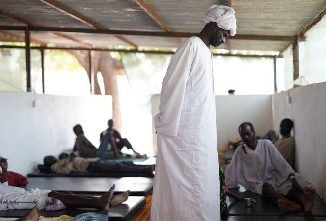 Injured people who fled fighting in El-Fasher are treated at a makeshift clinic run by Médecins Sans Frontieres (MSF), at a refugee camp in Tawila (Sudan), November 3, 2025.