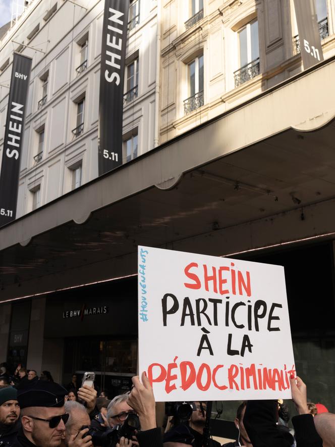 Activists demonstrate against the Shein brand, on the occasion of the opening of the Chinese brand's boutique at BHV, in Paris, on November 5, 2025.