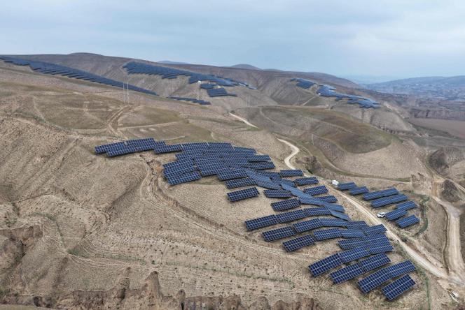 Solar panels are installed on arid mountains in Zhongwei (China), November 6, 2025.