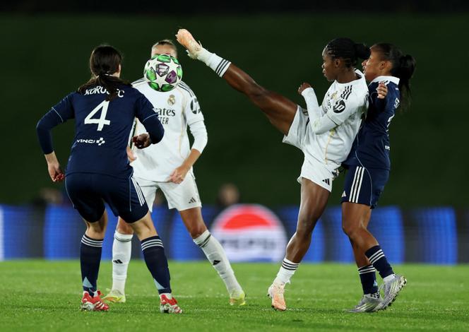Paris FC's Kaja Korosec (number 4) tries to stop Real Madrid's Linda Caicedo (right), during the Champions League, at the Alfredo Di Stefano stadium, in Madrid, November 11, 2025.