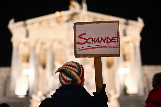 Protesters holding signs 
