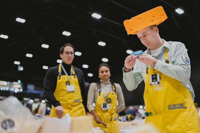 Kuba Maziarczyk, super jury member and Polish cheesemaker, smells a piece of cheese during the 37th edition of the World Cheese Awards, organised by the Guild of Fine Food, in Bern, on November 13, 2025.