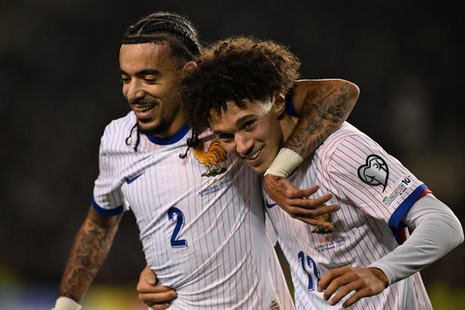 Malo Gusto (left) and Maghnes Akliouche during the French team's match against Azerbaijan in the 2026 World Cup qualifying match, in Baku, November 16.