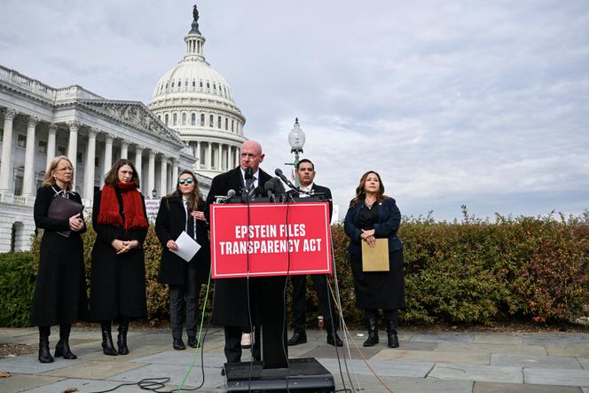 US Senator Mark Kelly speaks at a press conference with US Representative Adelita Grijalva calling for the release of the Epstein files on Capitol Hill in Washington, DC, November 18, 2025. 