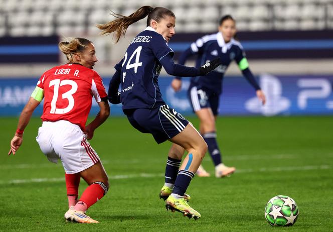 Paris FC player Anaële Le Moguédec duels with Benfica's Lucia Alves (left), on day 4 of the Champions League, at the Jean-Bouin stadium, in Paris, November 19, 2025.