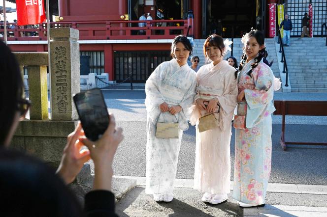 Chinese tourists at Senso-ji temple in Tokyo's Asakusa district on November 15, 2025.