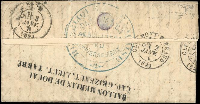 Guerre-franco-prussienne de 1870-1871, verso du pli transporté par ballon monté, confié au « Merlin-de-Douai », « Gazette des absents » datée du 25 décembre 1870, à destination de Riom (Puy-de-Dôme) touchée le 3 janvier 1871. Cachet des aérostiers et timbre à date de Clermont-Ferrand.