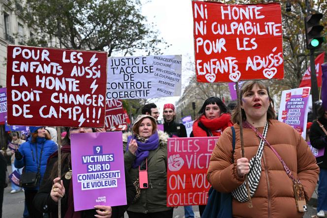 Demonstrators protest violence against women with the collective call #NousToutes, in Paris on November 22, 2025. 
