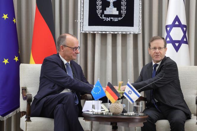 German Chancellor Friedrich Merz and Israeli president Isaac Herzog attend a meeting at the President's residence in Jerusalem, December 6, 2025.    Abir Sultan/Pool via REUTERS