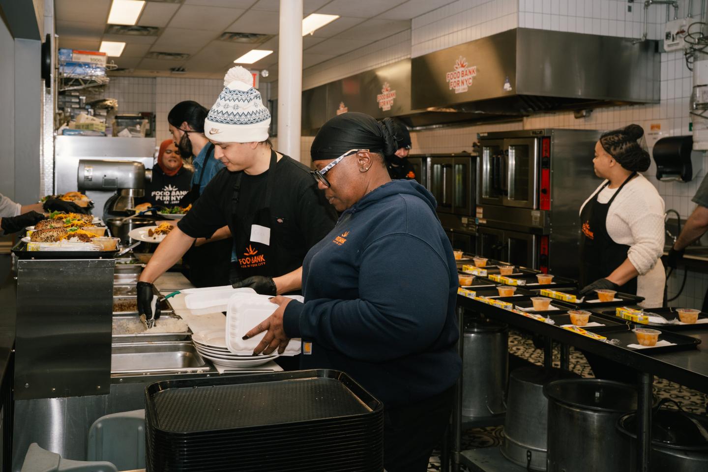 Dans une Â«Â cuisine communautaireÂ Â» de New York, aux premiÃ¨res loges de la crise du...