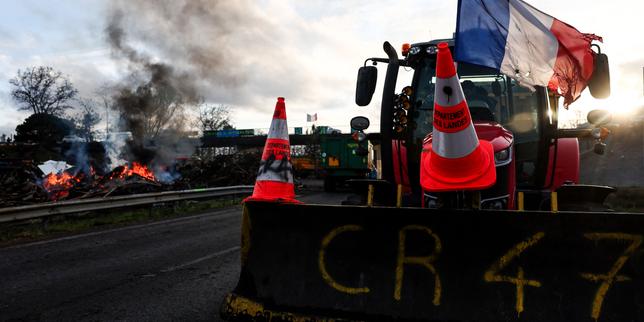 Macron meets French farmers in bid to defuse anger over trade deal
