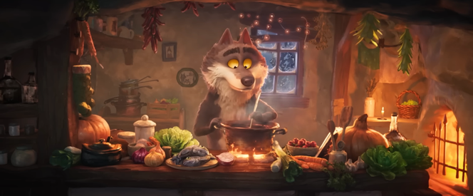 Capture d’écran d’une séquence de la publicité d’Intermarché mettant en scène un loup « mal-aimé ». On aperçoit des poissons parmi les victuailles rassemblées sur sa table de cuisine. Décembre 2025.