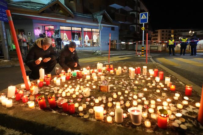 Shocked silence at vigil for Swiss fire victims