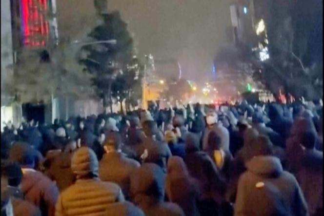 This frame grab from footage from Iran circulating on social media shows protesters taking to the streets of Tehran, Iran, on Saturday, January 10, 2026.