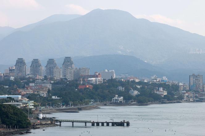 Buildings stand along the Tamsui waterfront in New Taipei City, Taiwan, on January 9, 2026.