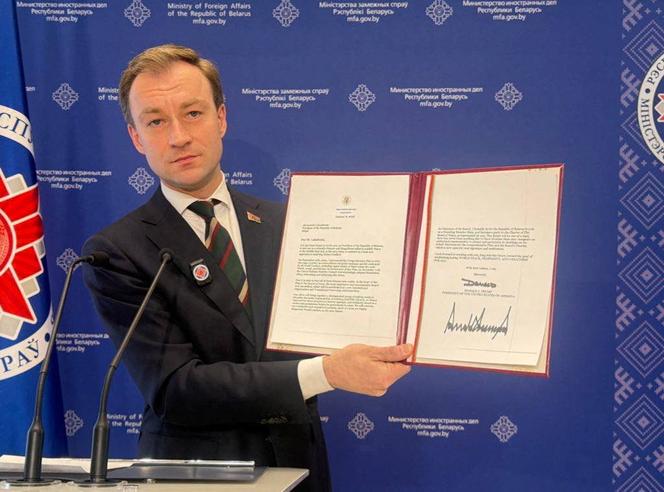 Ruslan Varankov, spokesperson for the Belarusian Ministry of Foreign Affairs, displays a letter from Donald Trump inviting Belarusian President Alexander Lukashenko to join the 'Board of Peace,' Minsk, January 19, 2026.