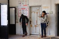 Palestinian patients wait to be examined at the Doctors Without Borders clinic in the Al-Rimal neighborhood of Gaza, December 31, 2025.