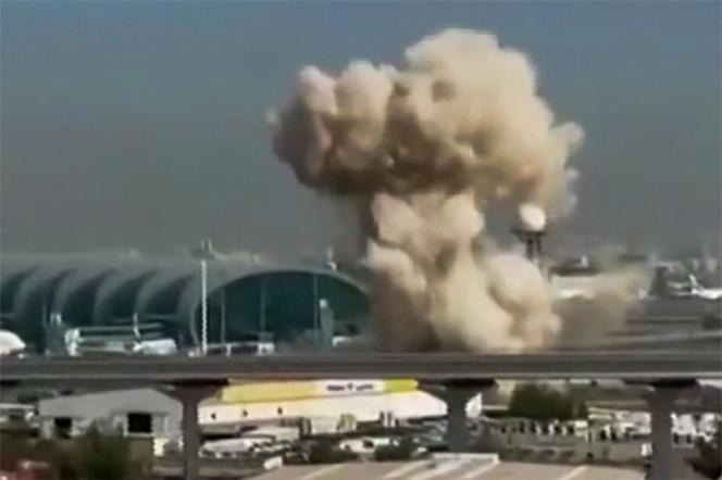 This video grab taken from UGC images posted on social media on March 7, 2026, shows smoke rising from the Dubai International Airport.