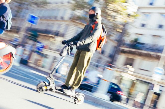 An electric scooter rider in central Paris, on October 24, 2024.
