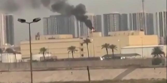 US embassy attacked in Baghdad, strikes hit Iran-backed fighters