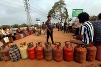 A queue for collecting filled gas cylinders in Bhubaneswar, India, March 16, 2026.
