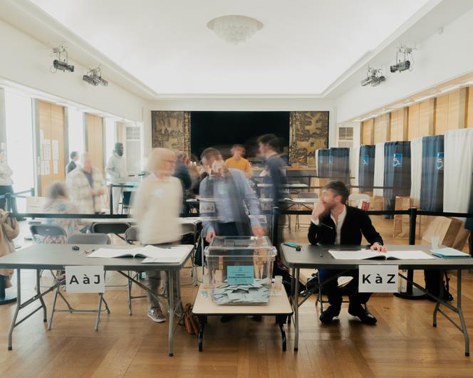 Dans un bureau de vote du 9ᵉ arrondissement de Paris, le 22 mars 2026.