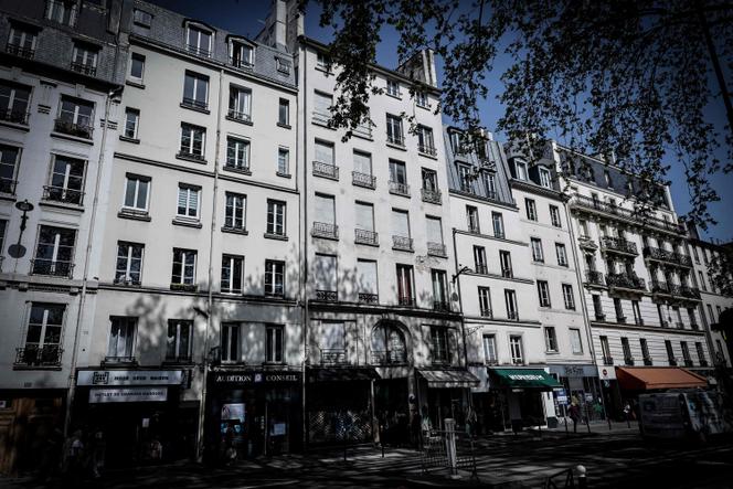 This photograph shows the outside facade of an unsanitary housing building in central Paris on April 9, 2026.