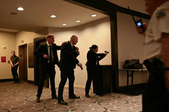 United States Secret Service agents drew their weapons after gunshots were heard during the White House Correspondents' Dinner at the Washington Hilton in Washington, on April 25, 2026.