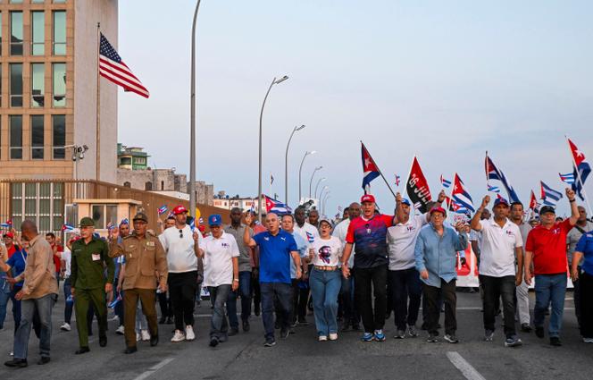 Cuba's President Miguel Diaz-Canel marches in front of the US Embassy during a May Day parade, Havana, Cuba May 1, 2026. 