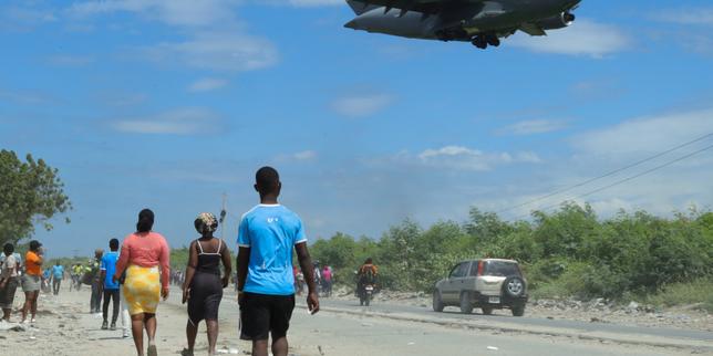 Gang clashes in Haiti capital kill dozens, force thousands to flee