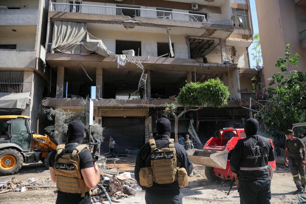 Le bâtiment touché par la frappe israélienne dans la banlieue sud de Beyrouth, le 14 juin 2026. - IBRAHIM AMRO/AFP