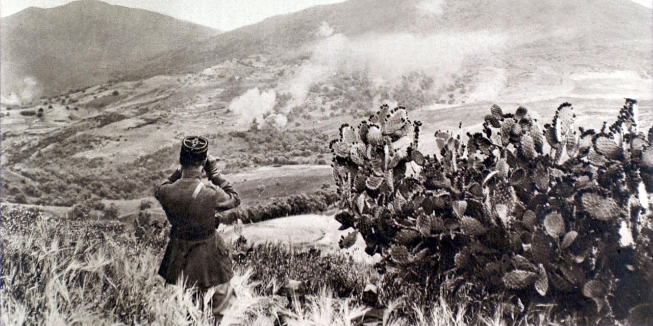 Morocco - June 1925 ; Rif War. With binoculars, a French artillery officer observing the effects of the bombardment on Rif positions. (Photo by Photo12 via AFP)