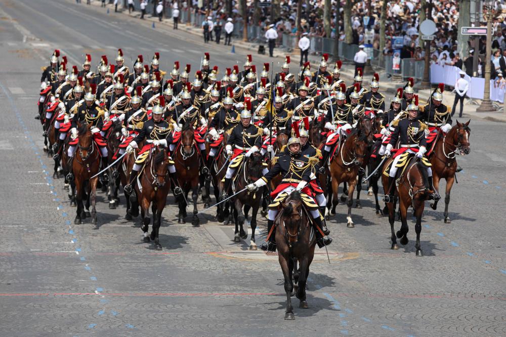 La Garde républicaine à cheval défile à Paris, le 14 juillet 2026. - LUDOVIC MARIN/AFP
