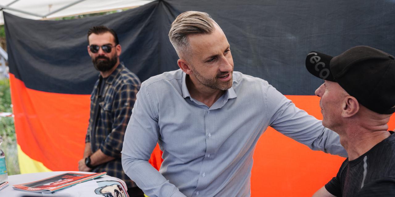 21 August 2026, Bad Dürrenberg, 06231, Germany. During an AfD election campaign event at the Kurpark, Ulrich Siegmund greets a visitor who wants to have a photograph taken with him.
