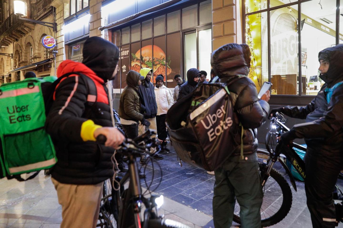 Four groups file human-trafficking complaint against Deliveroo and Uber