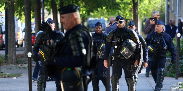 French teenager loses hand picking up police grenade in high school protests