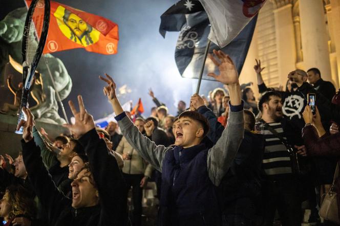 Supporters of the "student list" celebrate their victory in Serbia's parliamentary elections outside the National Assembly in Belgrade, October 25, 2026. - MARKO DJURICA/REUTERS